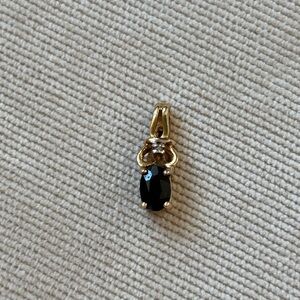 Elegant sapphire pendant set in 10k yellow gold